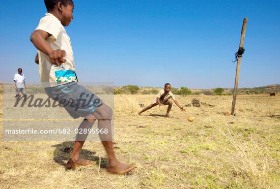 African Children Playing Football