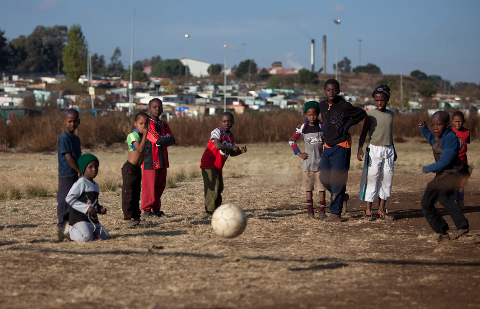 African Children Playing Football