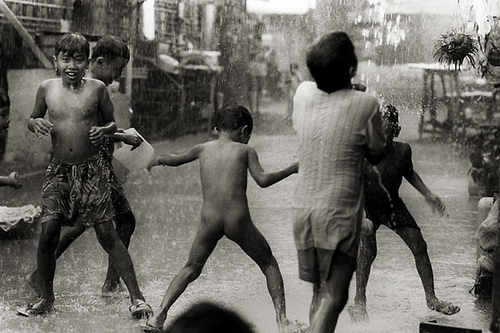 Pictures Of Children Playing In Rain