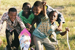 Black Children Playing With Toys