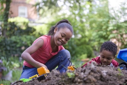 Black Children Playing With Toys