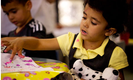 Black Children Playing With Toys