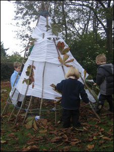 Children Playing Outside In A Nursery