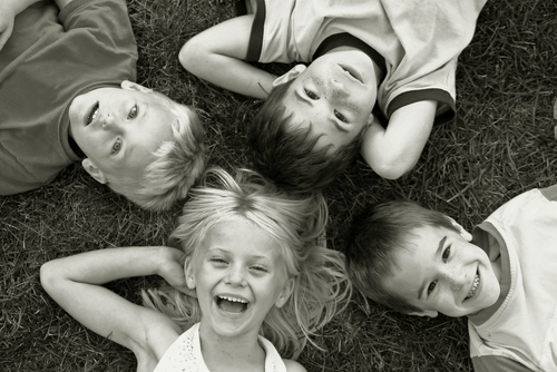 Children Playing Outside In The Park