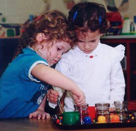 Children Playing Together With Toys