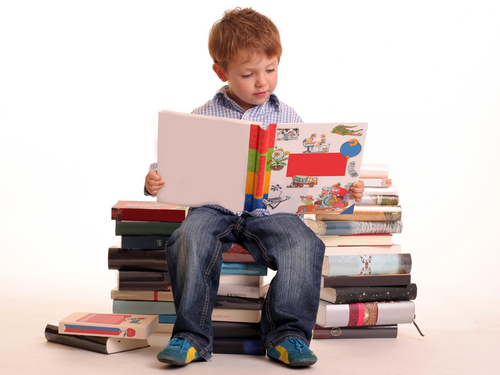 Children Reading Books In Library