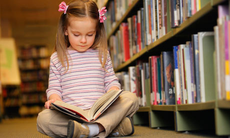 Children Reading Books In Library