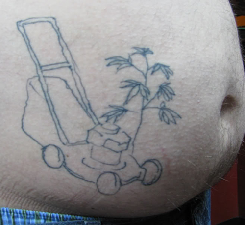 Lawn Mower Tattoo On Head