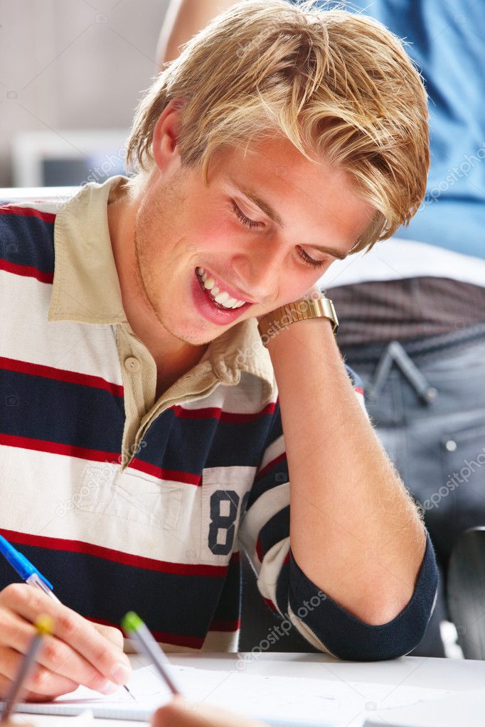 Students Studying In Classroom