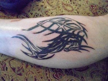 Tribal Dragon Tattoo On Leg