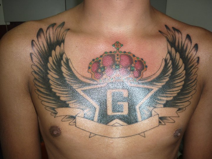 Wings Tattoo On Chest