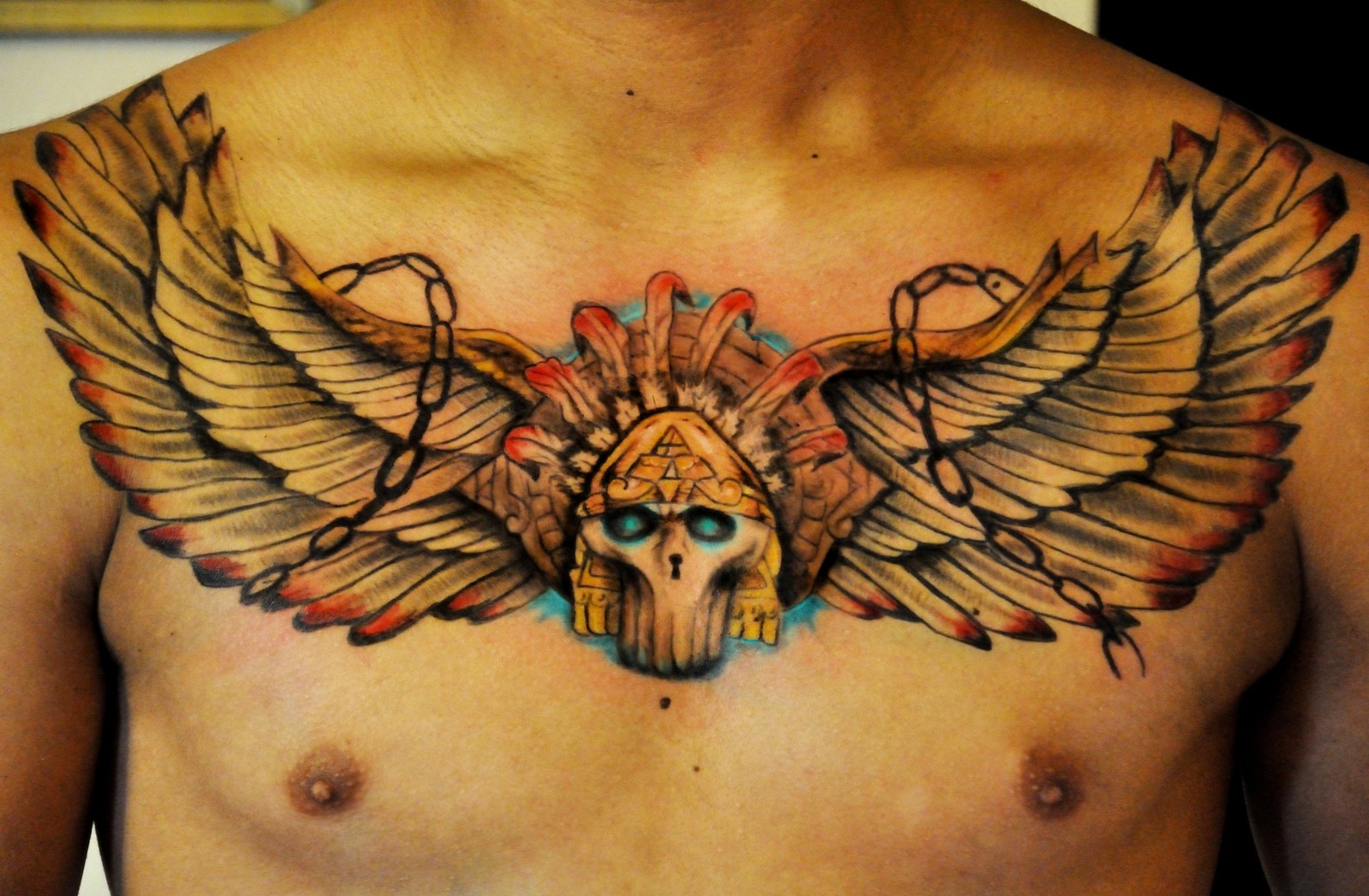 Wings Tattoo On Chest